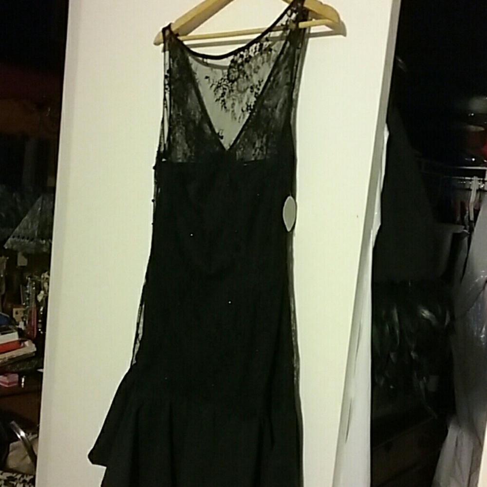 Evening dress with taffeta ruffle on bottom